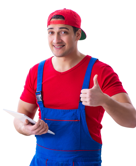 Smiling man giving thumbs up with moving boxes in the background